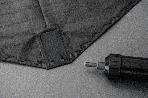Tail section of the kite finished with two holes